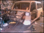 Firewall extensively wirebrushed to remove rust