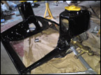 Freshly painted front subframe being built.